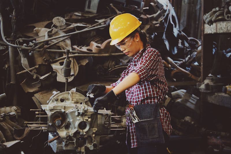 Industrial worker inspecting equipment